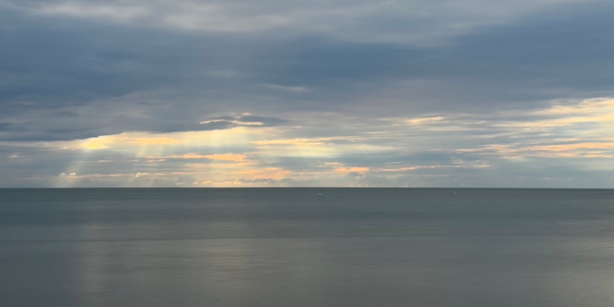 Calm ocean horizon and open sky by Samson California